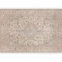 Fototapetti - Sand carpet - worn Persian carpet with rich decorative motifs