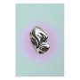 Juliste - Metallic Form - abstract sculpture on a mint background with a purple halo